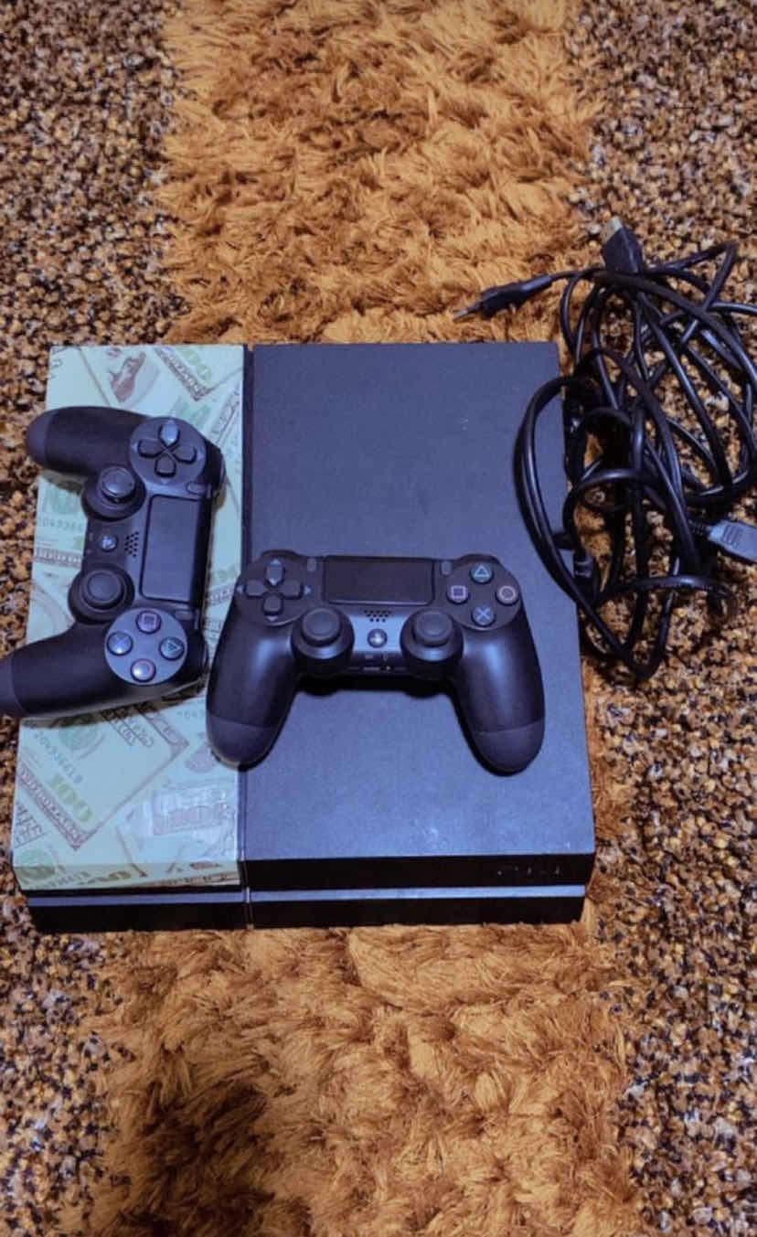 PlayStation 4 with 2 controllers 